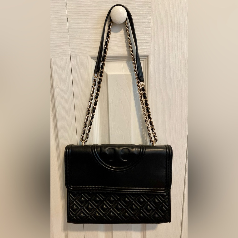 Tory Burch leather flap bag with magnetic closure